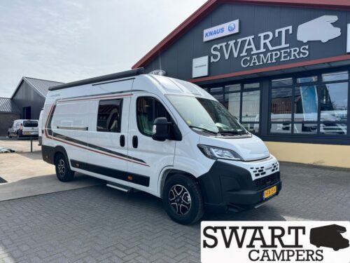WEINSBERG CARABUS 630 ME EDITION FIRE - Swart Campers White camper van parked in front of the Swart Campers showroom with roof rack and decals on the side.