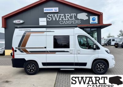 White Weinsberg camper van with brown and gray decals parked in front of a Swart Campers building.