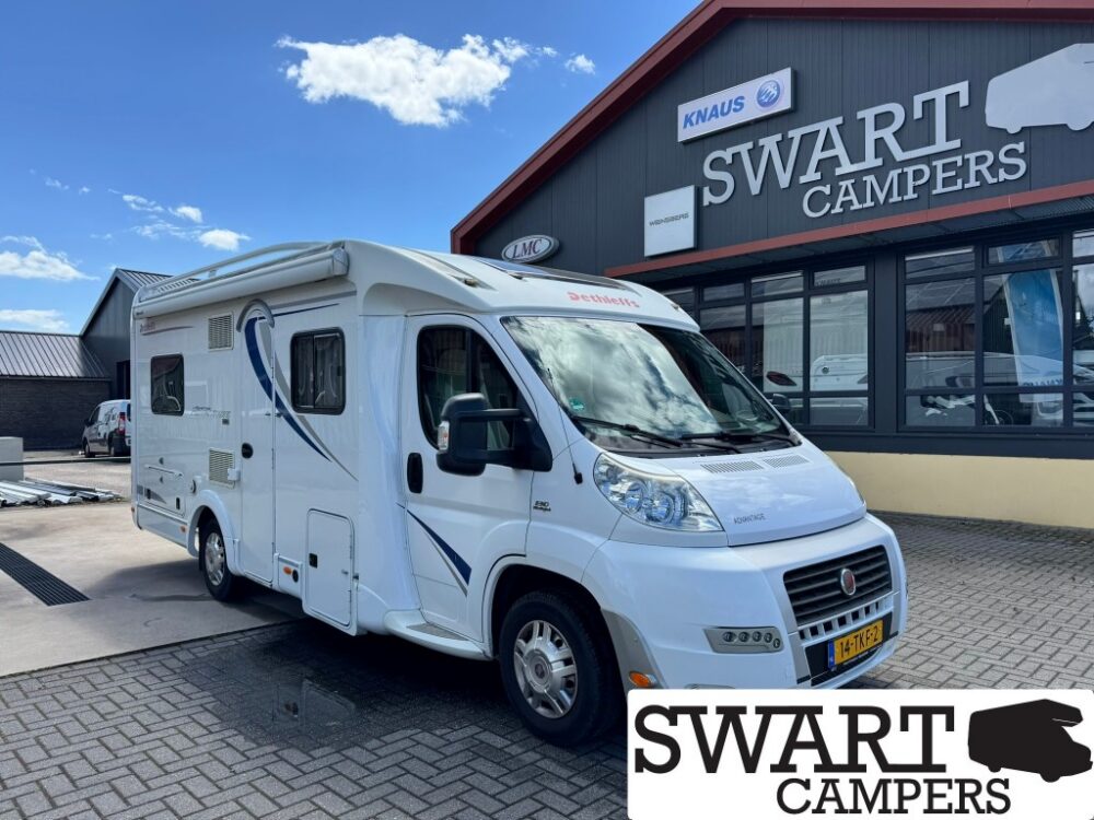 Dethleffs Advantage - Swart Campers White motorhome parked outside a Swart Campers showroom on a sunny day.