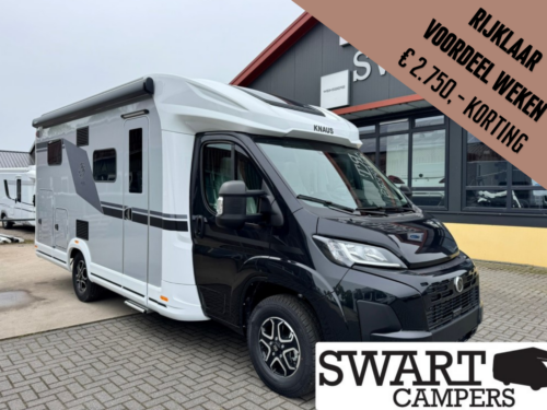 White and gray Knaus motorhome on a dealership lot, with a brown diagonal promo banner in the corner.