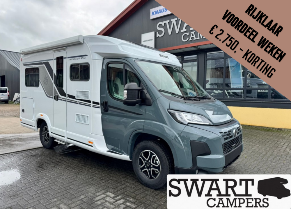 KNAUS VAN TI 550 MF VANSATION - Swart Campers White and gray motorhome parked outside a camper dealership with Swart Campers signage nearby.