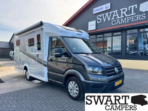 KNAUS VAN TI PLUS 650 MEG PLATINUM SELECTION - Swart Campers Front three-quarter view of a Knaus motorhome parked outside the Swart Campers showroom